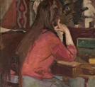 "Dziewczyna przy stole" Wilhelma Mitarskiego.