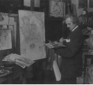 Bronisław Kopczyński podczas malowania obrazu w swojej pracowni.